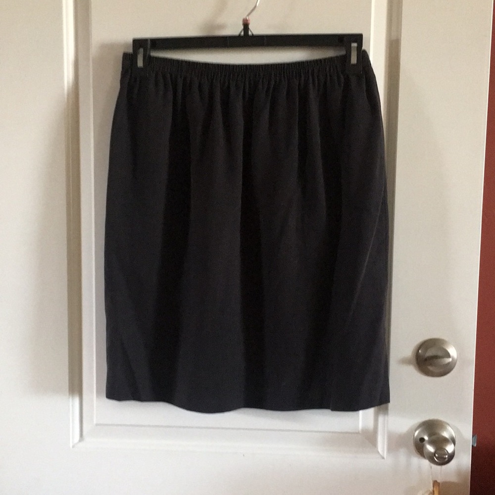 Women’s black silk skirt.